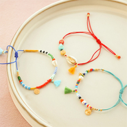 Set di ispirazione Idee creative con nappine nei colori dell'estate